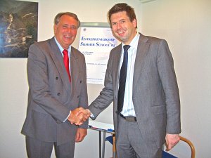 Dr.Austmeyer and Prof. Nicolai shake hands