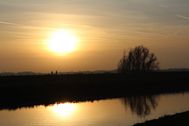Bild des Huntedeichs bei Sonnenuntergang im Herbst
