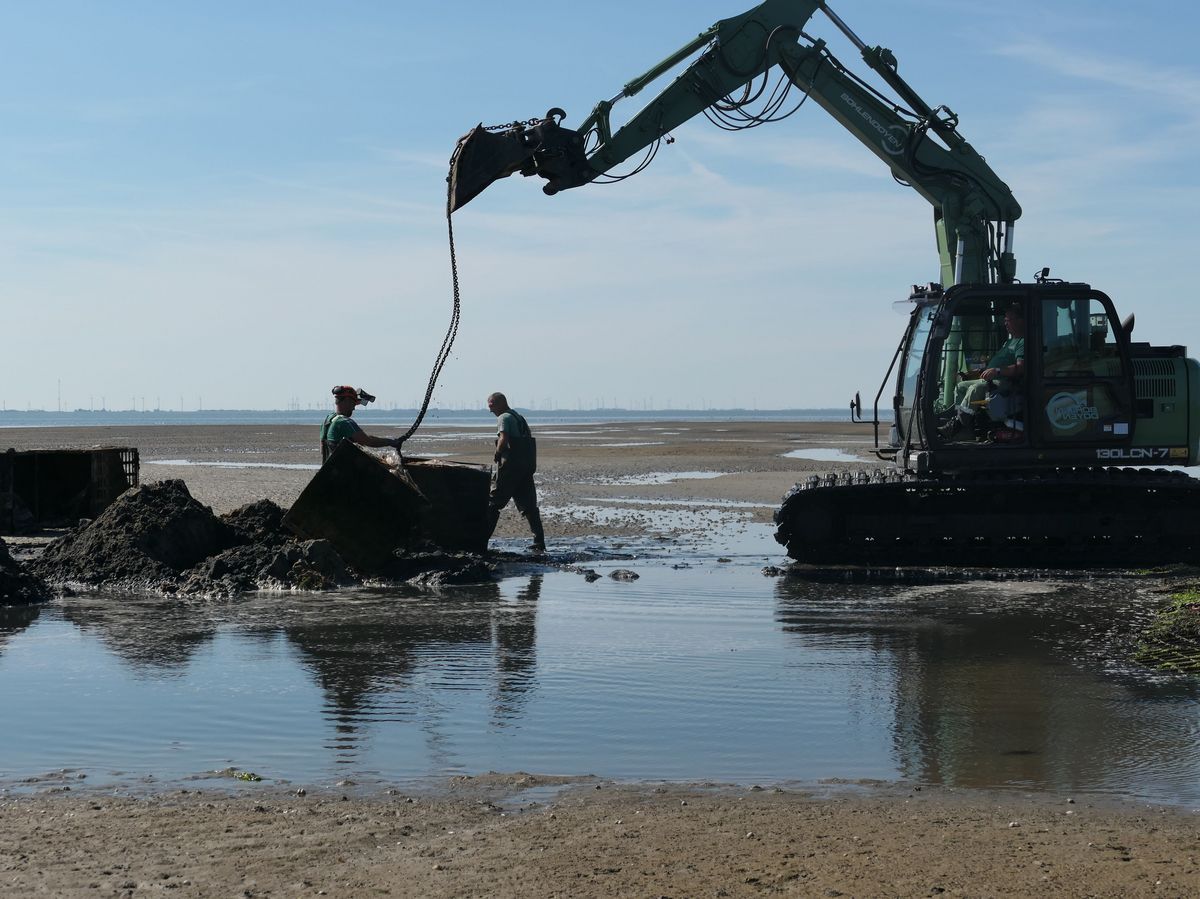 Excavator with artificial island