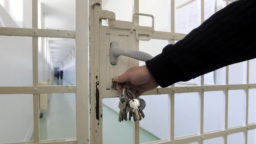 officer, prisoners, prison, doors, law, lock, police, detention, rebel, intervention, facility, guard, order, policy, lattice, iron, correctional, urban, escape, break, corridor, revolution, fence, freedom, weapon, jail, political, security, building, convict, bars, wall, protect, incarceration, crime, war, slammer, punishment, architecture, cell, force, criminal, uniform, insurgents, revolt, rebellion, metal, institution, cage, keys